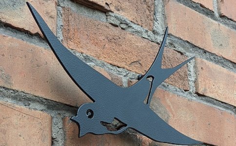 Kregždutės ant sienos