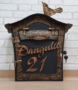 Mailbox with a bird and inscription