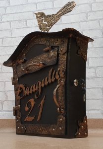 Mailbox with a bird and inscription