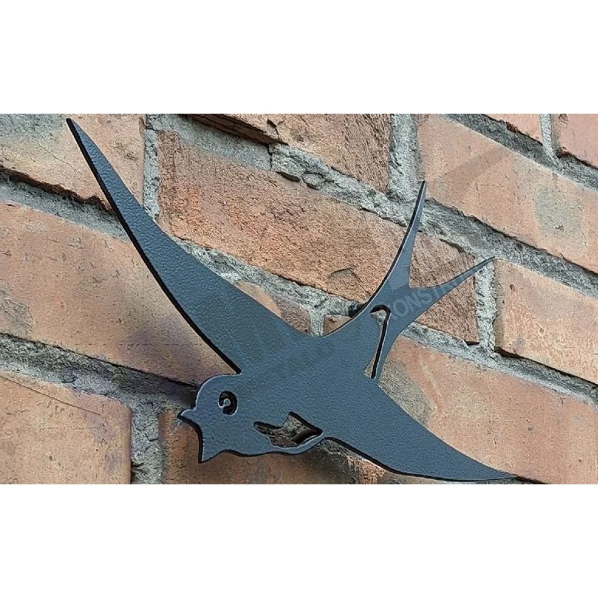 Swallows on the Wall